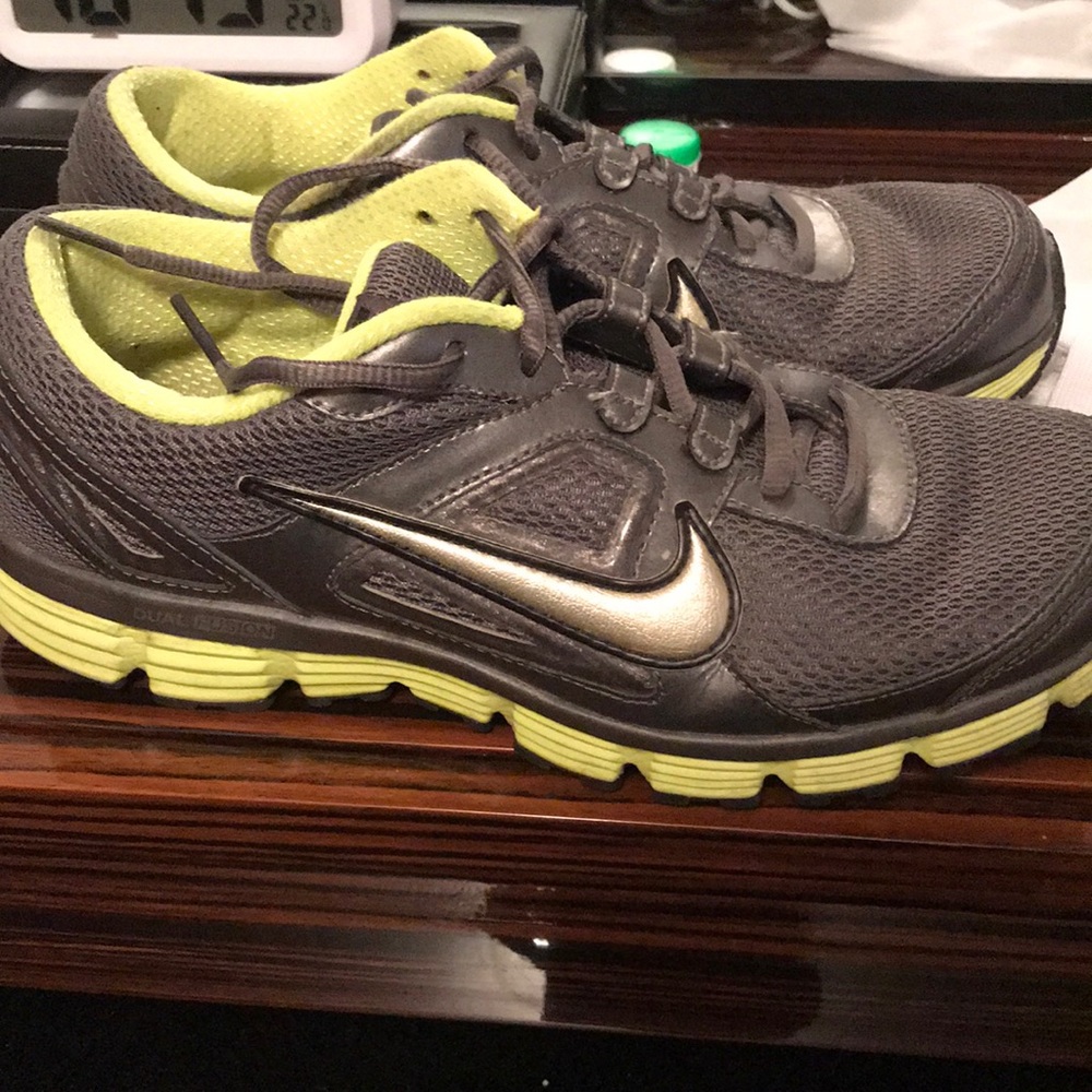 Grey Nike sneakers with green detail